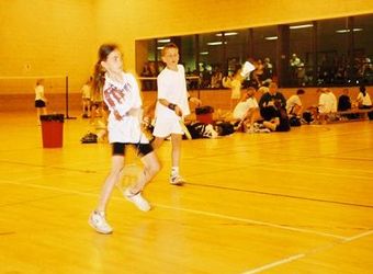 A mixed doubles game. Scottish Schools mixed doubles under 12s tournament - Tranent (near Edinburgh), May 2002