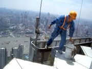 Window cleaner on one of thousands of skyscrapers in Shanghai. Chinese society has been rapidly modernizing in the last two decades, spawning the largest urban migration within a generation in human history.