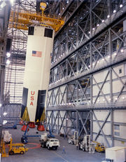 The first stage of Apollo 8 Saturn V being erected in the VAB on February 1, 1968