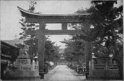 Gateway to Shinto shrine with torii gate