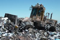 A landfill compaction vehicle in operation