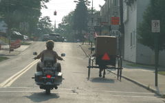 Amish and modern transportation in Pennsylvania.