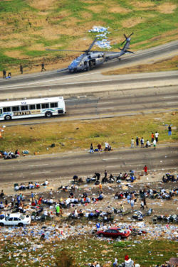 Hurricane evacuees in Jefferson Parish, Louisiana (in the Metairie community) being helped by the Air National Guard.