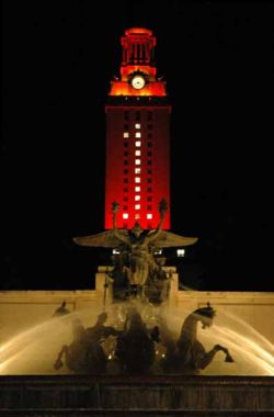 The Tower in orange after the Longhorns won the 2005 National Championship in football at the Rose Bowl. Littlefield Fountain is in the foreground.