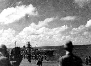 The Japanese cruiser Oyodo comes alongside the damaged Zuikaku so that Admiral Jisaburo Ozawa can transfer his flag.