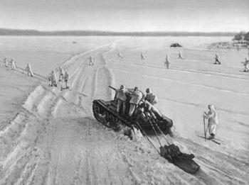 December, 1941. Soviet troops in winter gear supported by the tanks take on the Germans in the counter-attack.