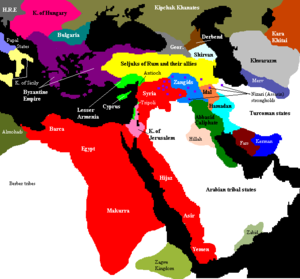 The Middle East, c. 1190. Saladin's empire and its vassals shown in red; territory recovered from the Crusader states 1187-1189 shown in pink. Light green indicates Crusader territories surviving at Saladin's death.