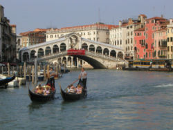 Venice: "Flat water before me, / and the trees growing in water, / Marble trunks out of stillness, / On past the palazzi, / in the stillness, The light now, not of the sun" (Canto XVII)