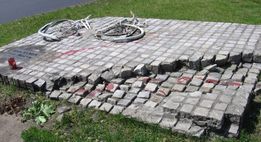 A memorial depicting a destroyed bicycle and a tank-track - symbol of the Tiananmen Square protests - in the Polish city of Wrocław