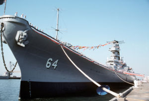 Crew members man the rails aboard Wisconsin during her decommissioning ceremony.