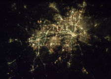 The DFW Metroplex at night, photographed from the International Space Station in early 2003. Dallas is the larger nexus of light on the right (east), Fort Worth the smaller on the left (west).