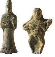 Figurines playing the ancestor of the Guitar. Excavated in Susa, Iran. Dated 2000-1500 B.C. Kept at the National Museum of Iran.