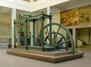 A Watt steam engine in Madrid. The development of the steam engine started the industrial revolution in England. The steam engine was created to pump water from coal mines, enabling them to be deepened beyond groundwater levels.