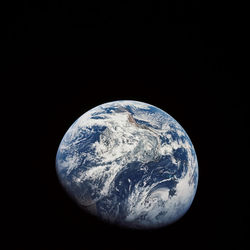 One of the first images taken by humans of the whole Earth, probably photographed by Bill Anders; South is up with South America in the middle.