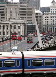 London Bridge at 0800. The bridge is a major commuter route into the City of London