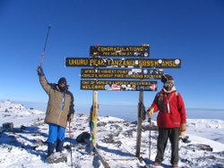 Tanzania's Deputy Minister for Foreign Affairs with a guide at the summit.