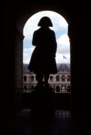 Statue of Napoléon in Les Invalides, eyes on the French flag.