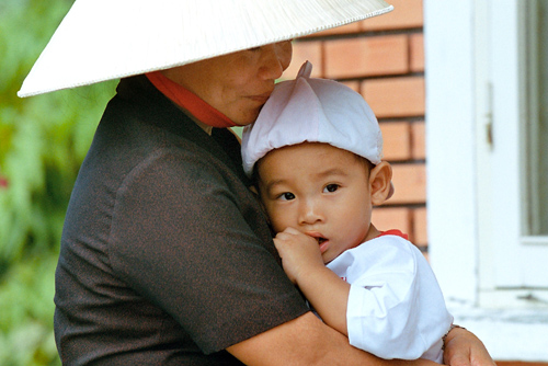 Mother hugging child